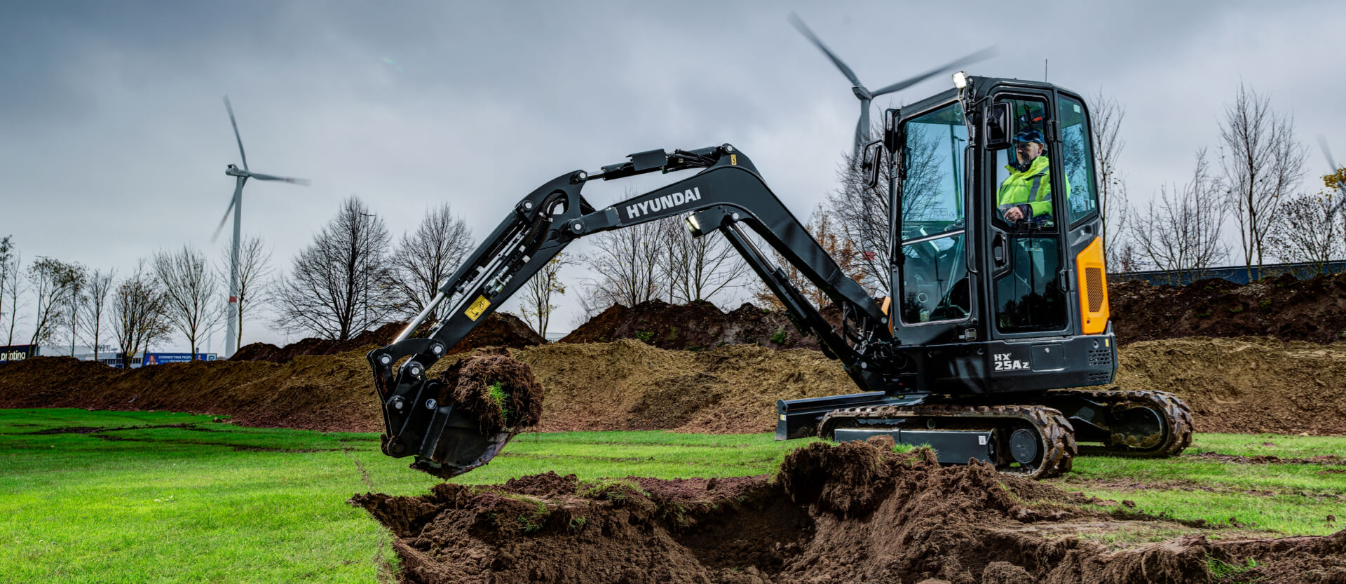 Hyundai HX25A Z Mini Excavator Landscaping removing turf